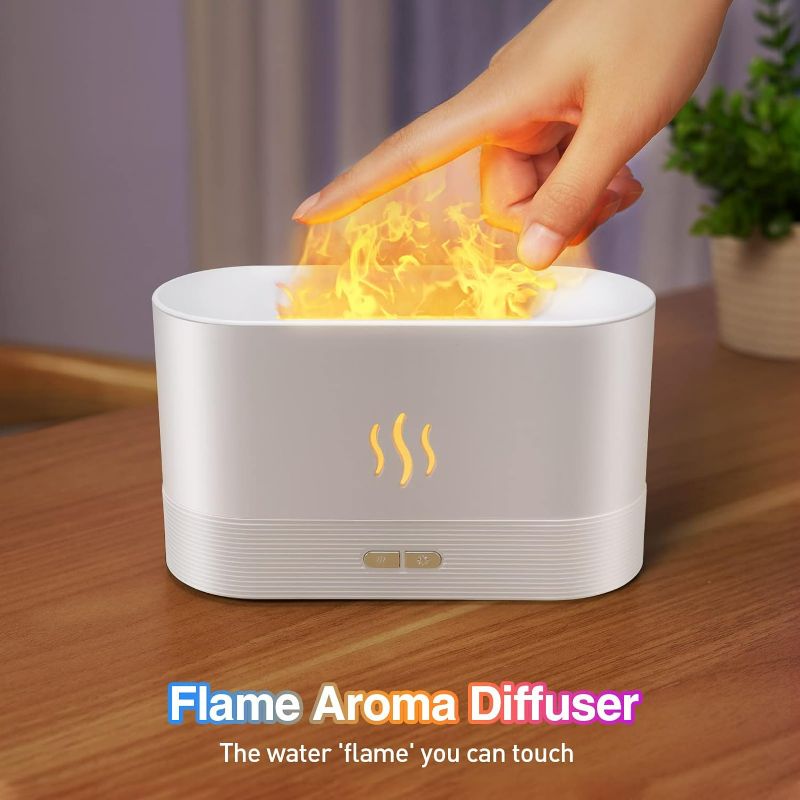 Photo 1 of 
Colorful Flame Air Aroma Diffuser Humidifier, Upgraded 7 Flame Color Noiseless Essential Oil Diffuser for Home,Office,Yoga with Auto-Off Pro