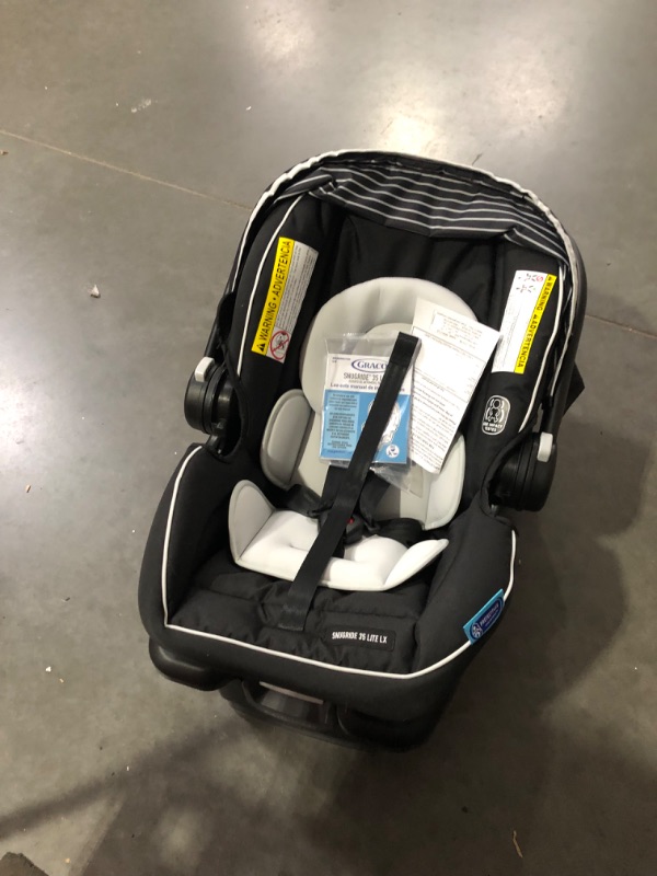 Photo 6 of ***USED - LIKELY MISSING PARTS - UNABLE TO VERIFY FUNCTIONALITY***
Graco SnugRide 35 Lite LX Infant Car Seat, Studio SnugRide 1 Count (Pack of 1) Studio