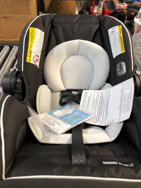 Photo 3 of ***USED - LIKELY MISSING PARTS - UNABLE TO VERIFY FUNCTIONALITY***
Graco SnugRide 35 Lite LX Infant Car Seat, Studio SnugRide 1 Count (Pack of 1) Studio