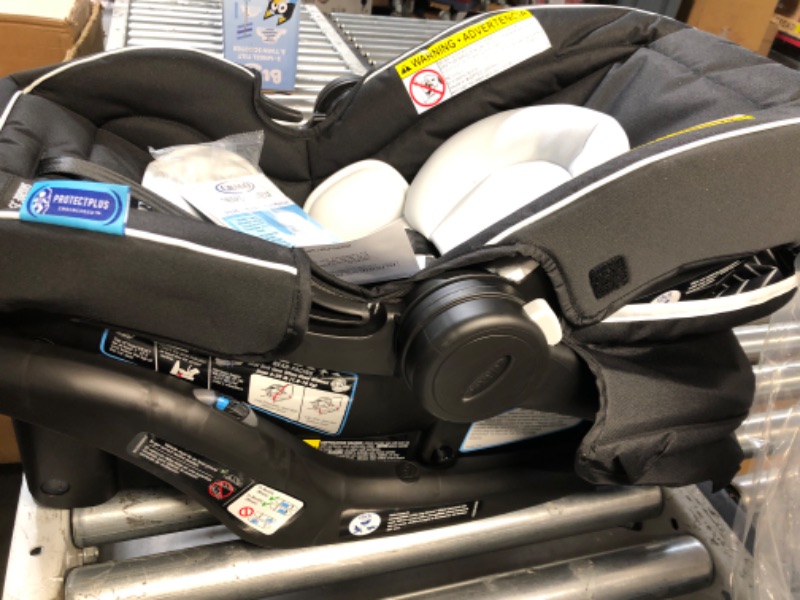 Photo 2 of ***USED - LIKELY MISSING PARTS - UNABLE TO VERIFY FUNCTIONALITY***
Graco SnugRide 35 Lite LX Infant Car Seat, Studio SnugRide 1 Count (Pack of 1) Studio