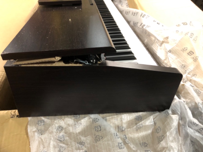 Photo 9 of ***USED - MAJOR DAMAGE - SEE COMMENTS***
Yamaha Arius, 88-Key Weighted Action Digital Aspiring Musicians, CFX Concert Grand Piano Voice, 3-Pedal Unit, Bench Included, Classic Upright Design, Dark Rosewood (YDP145R)