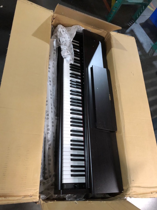 Photo 11 of ***USED - MAJOR DAMAGE - SEE COMMENTS***
Yamaha Arius, 88-Key Weighted Action Digital Aspiring Musicians, CFX Concert Grand Piano Voice, 3-Pedal Unit, Bench Included, Classic Upright Design, Dark Rosewood (YDP145R)