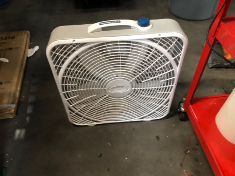 Photo 1 of ***UESD - DOESN'T POWER ON - UNABLE TO TROUBLESHOOT - SEE PICTURES***
Lasko Weather-Shield Performance Box Fan, 3 Speeds, Innovative Wind Ring System for Up to 30% More Air, Carry Handle for Bedroom, Office, Home, 20 Inch, White, 3720