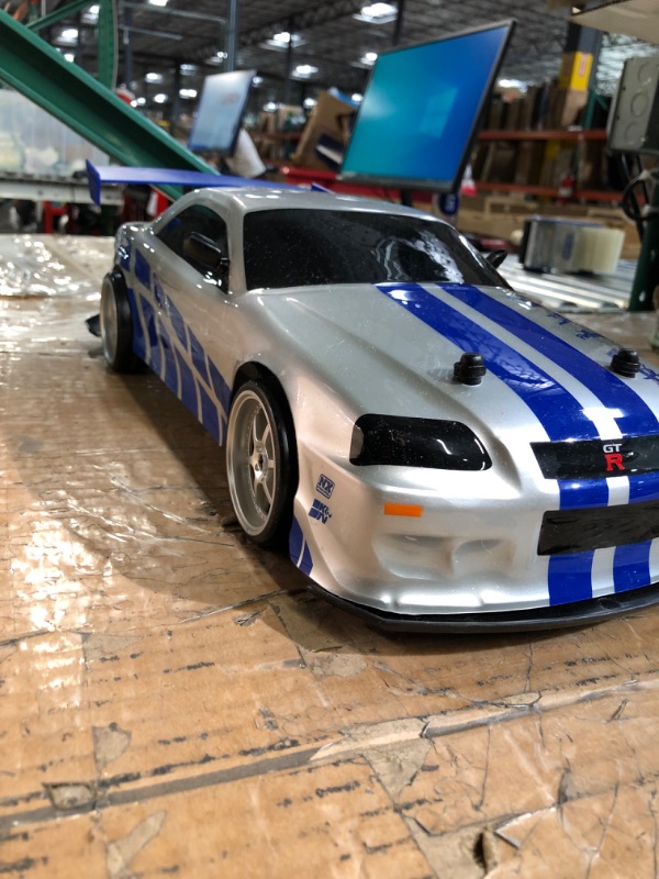 Photo 3 of *LOOK AT COMMENTS*
Jada Toys Fast & Furious Brian's Nissan Skyline GT-R (BN34) Drift PowerSilver/Blue (99701)