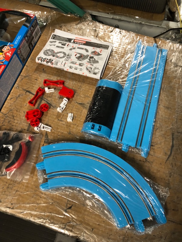 Photo 5 of *FOR PARTS ONLY* READ NOTES
Carrera First Disney/Pixar Cars - Slot Car Race Track - Includes 2 Cars: Lightning McQueen and Dinoco Cruz - Battery-Powered Beginner Racing Set for Kids Ages 3 Years and Up Disney Cars w/ Spinners