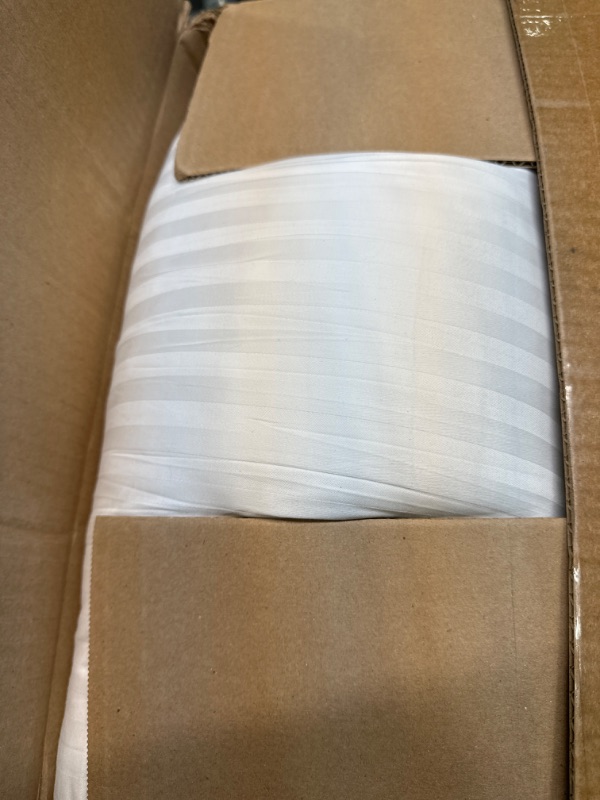 Photo 1 of 2 white pillows