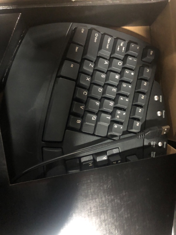 Photo 1 of Perixx Periboard-512 Ergonomic Split Keyboard - Natural Ergonomic Design - Black - Bulky Size 19.09"x9.29"x1.73", US English Layout Wired Black Keyboard