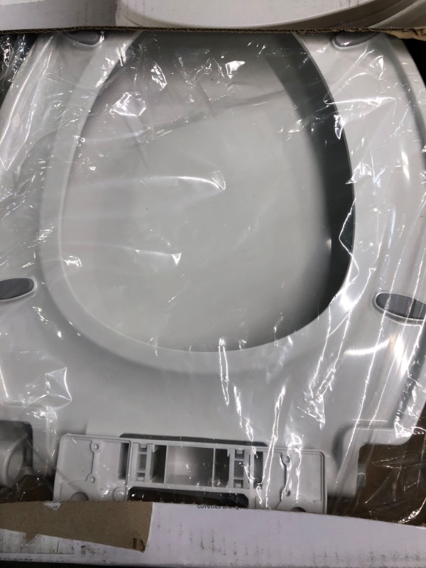 Photo 3 of **USED** Delta -Faucet Morgan Elongated Slow-Close White Toilet Seat with Non-Slip Seat Bumpers, White 811903-WH Toilet Seat Slow Close