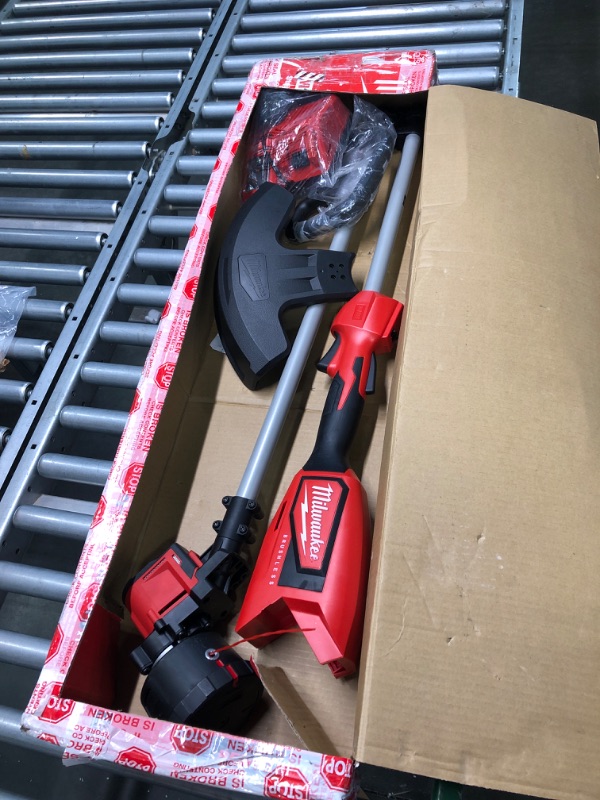 Photo 3 of ** FOR PARTS ONLY ** Milwaukee M18 Brushless String Trimmer Kit w Battery and Charger 2828-21 ***Tool Only***