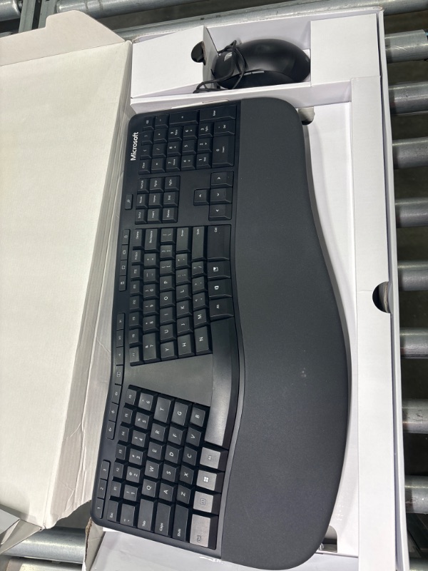 Photo 3 of Microsoft Ergonomic Desktop - Black - Wired, Comfortable, Ergonomic Keyboard and Mouse Combo, with Cushioned Wrist and Palm Support. Split Keyboard. Dedicated Office Key.