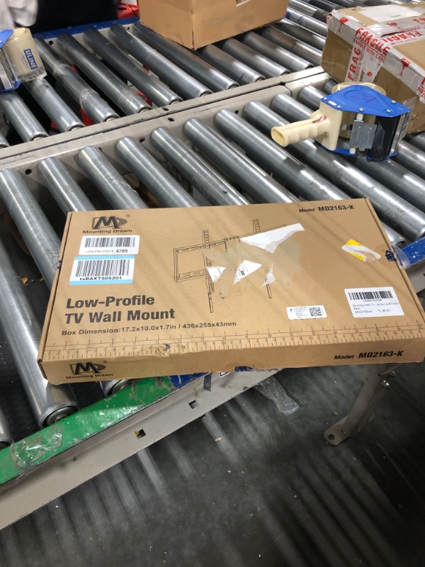 Photo 1 of Mounting Dream TV Mount Fixed for Most 42-70 Inch Flat Screen TVs, UL Listed TV Wall Mount Bracket up to VESA 600 x 400mm and 132 lbs - Fits 16"/18"/24" Studs - Low Profile and Space Saving MD2163-K