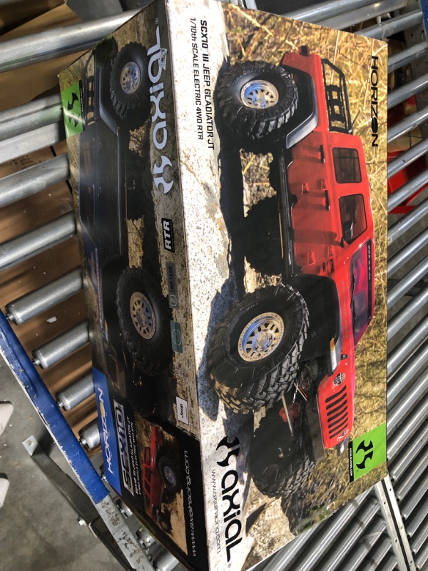 Photo 2 of Axial RC Truck 1/10 SCX10 III Jeep JT Gladiator Rock Crawler with Portals RTR (Batteries and Charger Not Included), Gray, AXI03006BT1 Grey