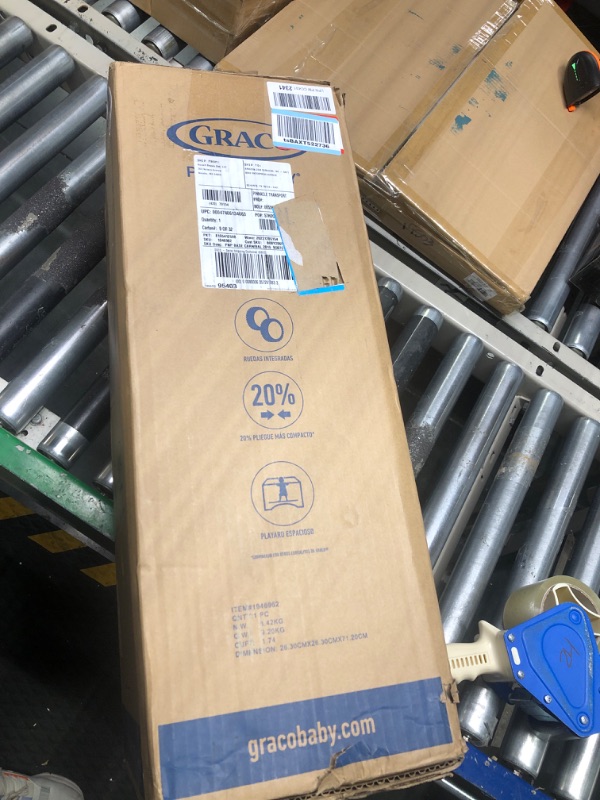 Photo 1 of Graco Pack 'n Play Playard with Automatic Folding Feet, Carnival