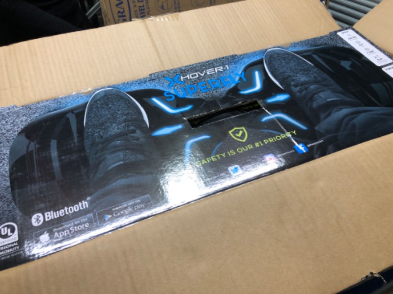 Photo 3 of Hover-1 Superfly Electric Hoverboard, 7MPH Top Speed, 6 Mile Range, Long Lasting Li-Ion Battery, 5HR Full Charge, Built-In Bluetooth Speaker, Rider Modes: Beginner to Expert, Black (Fixed)