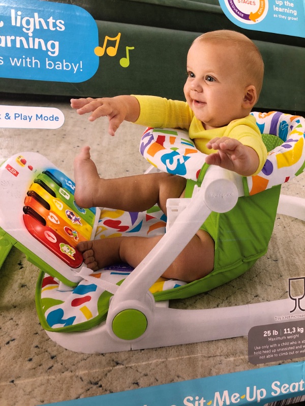 Photo 1 of Fisher-Price Baby Portable Chair Kick & Play Deluxe Sit-Me-Up Seat with Piano Learning Toy & Snack Tray for Infants to Toddlers