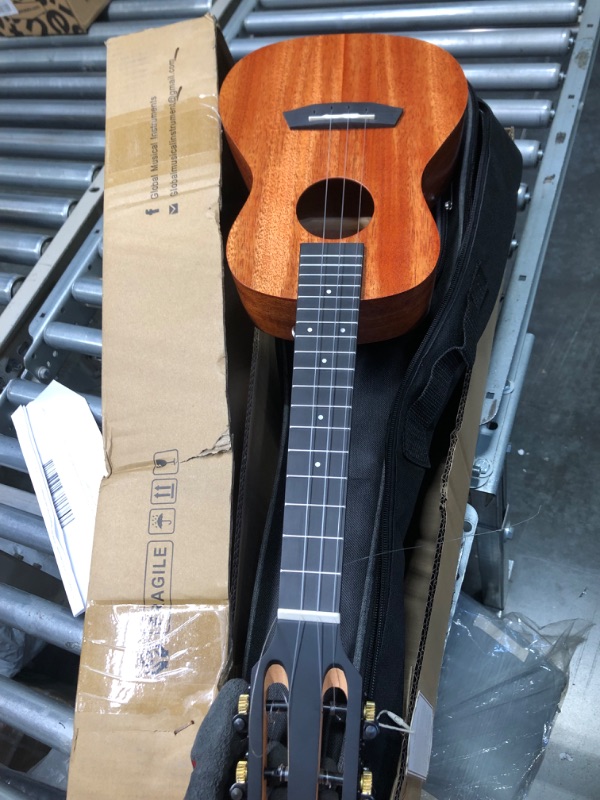 Photo 3 of AODSK Ukulele for Beginners Kit,Solid Mahogany 23 Inch Concert Ukelele Starter Bundle Kit with Free Gig Bag Strap,Professional Acoustic Ukelele Four String Wooden Hawaiian Uke for Kids Students Concert UAUC-V01 2.0 Mahogany