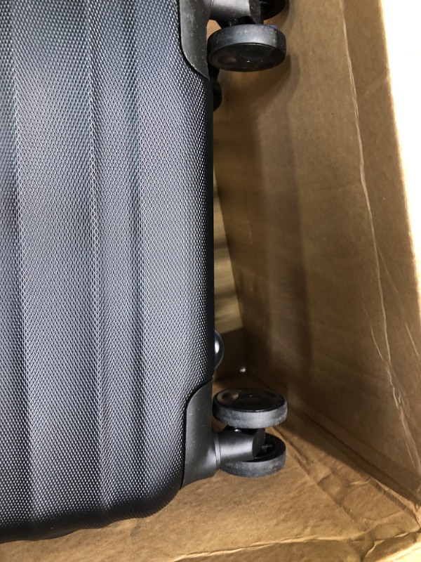 Photo 1 of Amazon Basics 20-Inch Hardside Spinner, Black
