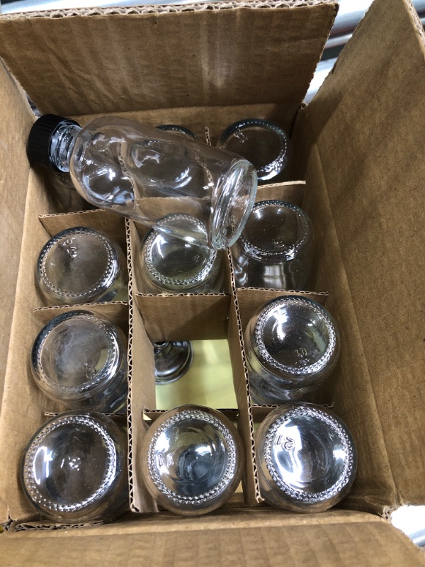 Photo 1 of 12, 2 oz Small Clear Glass Bottles (60ml) with Lids & 3 Stainless Steel Funnels - Boston Round Sample Bottles for Potion, Juice, Ginger Shots, Oils, Whiskey, Liquids - Mini Travel Bottles, NO Leakage