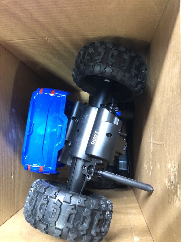 Photo 3 of DOUBLE E RC Cars Remote Control Car 1:12 Off Road Monster Truck for Boy Adult Gifts,2.4Ghz All Terrain Hobby Car,4WD Dual Motors LED Headlight Rock Crawler Blue Large