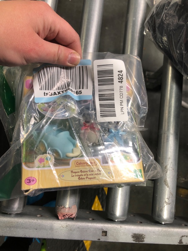 Photo 1 of Calico Critters Penguin Babies Ride 'n Play - Doll Playset with 2 Poseable Figures, Pushcart & More! Penguin Twins