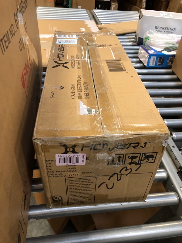 Photo 1 of **USED** Hover-1 Drive Electric Hoverboard | 7MPH Top Speed, 3 Mile Range, Long Lasting Lithium-Ion Battery, 6HR Full-Charge, Path Illuminating LED Lights