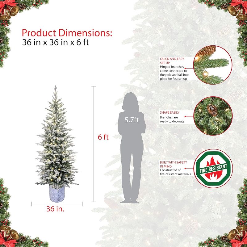 Photo 1 of **USED NEEDS CLEANED** 4.5 ft** Puleo International Pre-Lit Potted Flocked Arctic Fir Pencil Artifical Artificial Christmas Tree, Green, 301-PTO9760-60LW120