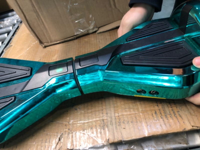 Photo 3 of 
*** FOR PARTS *** HOVERSTAR Hoverboard with Bluetooth Speaker, LBW19 Chrome Color Self Balancing Scooters with Science Fiction Design and 6.5 inch LED Wheels Chrome Turquoise