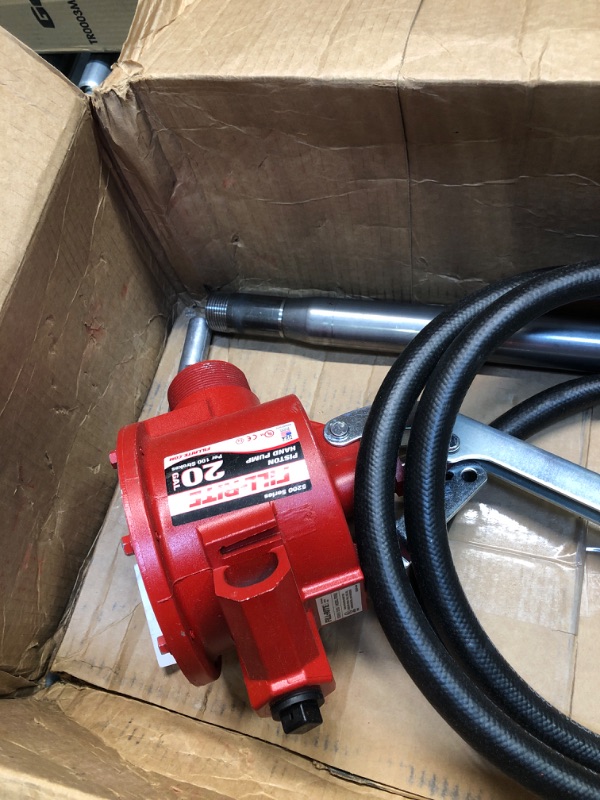 Photo 1 of Fill-Rite FR152 Piston Hand Pump with Hose & Nozzle Spout, Red Piston w/Spout & Hose