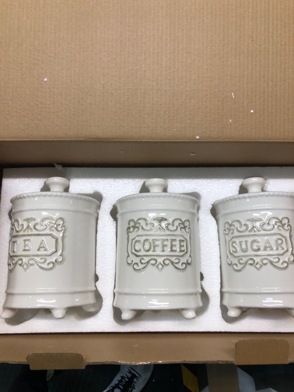 Photo 1 of 25 Ounce Elegant Ceramic Kitchen Canisters Set of 3 - Beautifully Engraved Coffee Tea Sugar Storage Containers Airtight with Feet for Added Style and Stability - Ceramic Jar with Lid That's Airtight