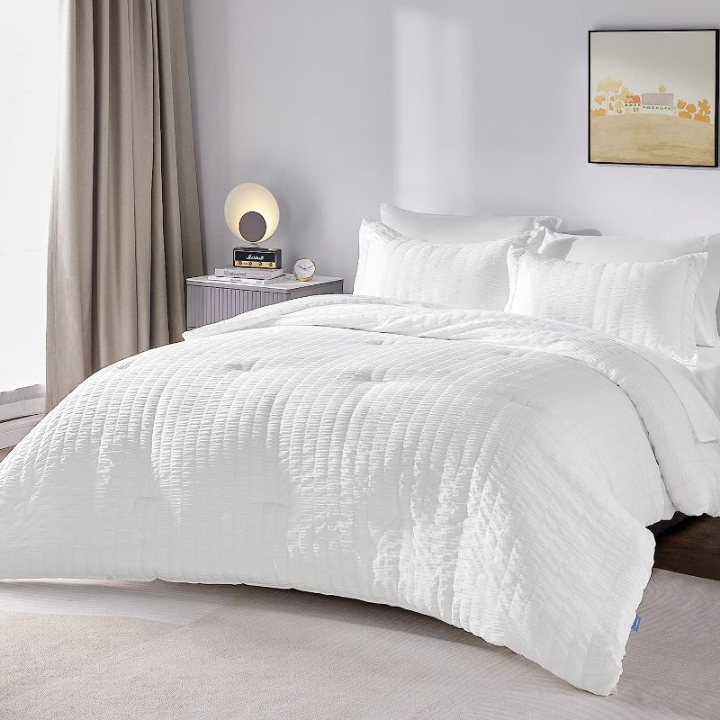 Photo 1 of **New Open**CozyLux seersucker King Comforter