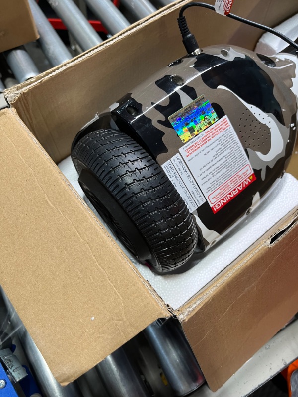 Photo 1 of **tested new open box**Hover-1 Helix Electric Hoverboard | 7MPH Top Speed, 4 Mile Range, 6HR Full-Charge, Built-in Bluetooth Speaker, Rider Modes: Beginner to Expert Hoverboard Camo