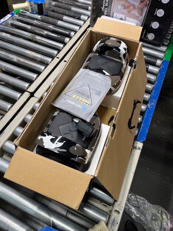 Photo 1 of **tested new open box**Hover-1 Helix Electric Hoverboard | 7MPH Top Speed, 4 Mile Range, 6HR Full-Charge, Built-in Bluetooth Speaker, Rider Modes: Beginner to Expert Hoverboard Camo