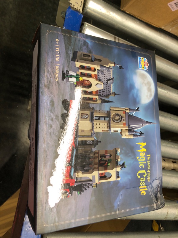 Photo 2 of ******NOT COMPLETE SET******
 QLT Harry Castle Clock Tower Building Toy Set with Lighting, Compatible with Lego Train, Gift Ideas for Potter Fans Boys Kids Aged 8-14, Collectible Magic Castle Architecture Model for Adult (868 PCS)