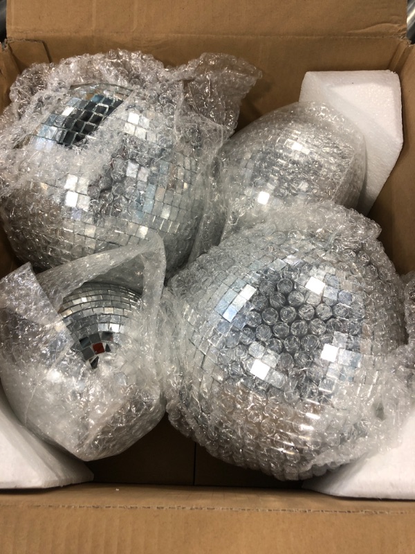 Photo 3 of 4 Pack Large Disco Ball Silver Hanging Disco Balls Reflective Mirror Ball Ornament for Party Holiday Wedding Dance and Music Festivals Decor Club Stage Props DJ Decoration (4 Inch, 20 Inch)