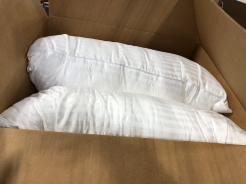 Photo 1 of 2 white pillows