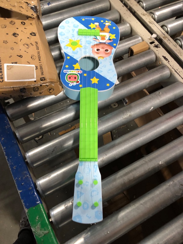 Photo 2 of CoComelon Musical Guitar by First Act, 23.5” Kids Guitar - Plays Clips of The ‘Finger Family’ Song - Musical Instruments for Kids, Toddlers, and Preschoolers