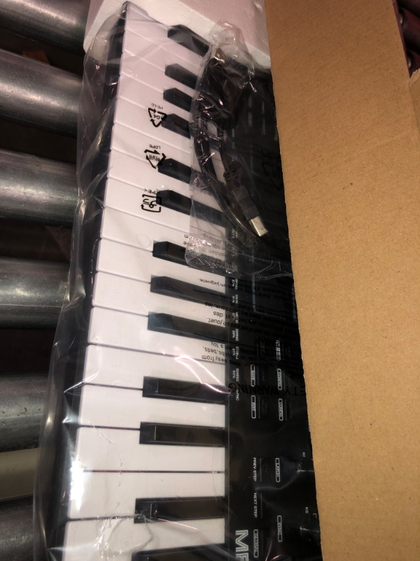 Photo 1 of Akai Professional MPK Mini Plus - USB MIDI Keyboard Controller with 37 Mini Keys, 8 MPC Pads, Sequencer & Focusrite Scarlett Solo 3rd Gen USB Audio Interface, for the Guitarist, Vocalist Plus MPK Mini + Audio Interface