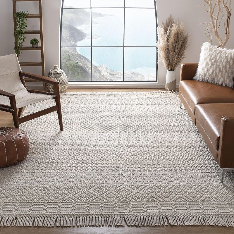 Photo 1 of 
SAFAVIEH Natura Collection Area Rug - 8' x 10', Ivory, Handmade Moroccan Boho Wool Fringe, Ideal for High Traffic Areas in Living Room, Bedroom...
Size:8' x 10'