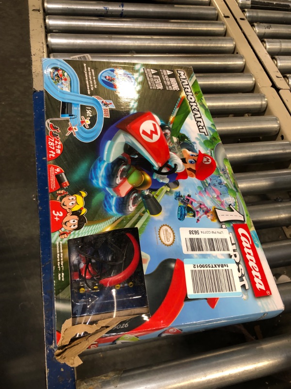 Photo 2 of Carrera First Mario Kart - Slot Car Race Track With Spinners - Includes 2 Cars: Mario and Yoshi - Battery-Powered Beginner Racing Set for Kids Ages 3 Years and Up Mario Kart w/ Spinners