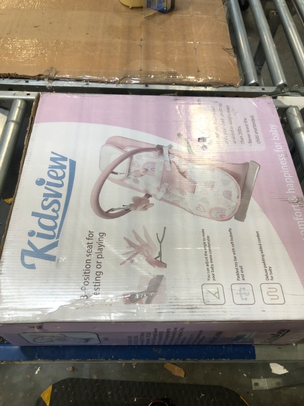 Photo 1 of Baby Bouncer for Infants, Baby Bouncer with 3-Point Harness, Infant to Toddler Rocker Bouncer for Babies with Removable Toys Bar & Hanging Toys in Pink | 0-6 Months