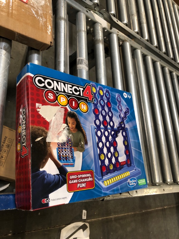 Photo 1 of Connect 4 Spin Game, Features Spinning Connect 4 Grid, 2 Player Board Games for Family and Kids, Strategy , Ages 8 and Up