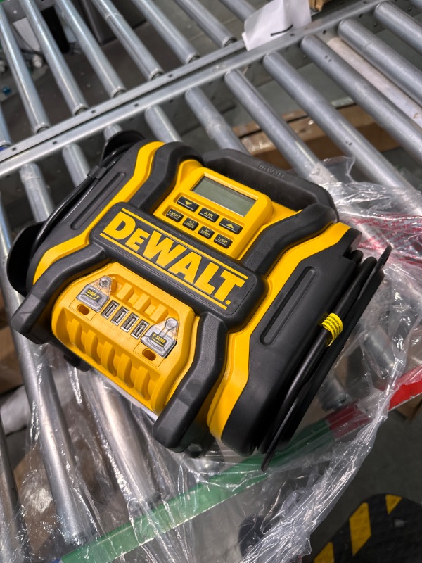 Photo 3 of ******FOR PARTS**** 
DEWALT DXAEPS14 1600 Peak Battery Amp 12V Automotive Jump Starter/Power Station with 500 Watt AC Power Inverter, 120 PSI Digital Compressor, and USB Power , Yellow