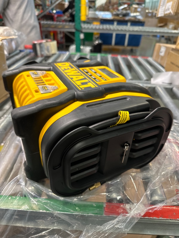 Photo 4 of ******FOR PARTS**** 
DEWALT DXAEPS14 1600 Peak Battery Amp 12V Automotive Jump Starter/Power Station with 500 Watt AC Power Inverter, 120 PSI Digital Compressor, and USB Power , Yellow