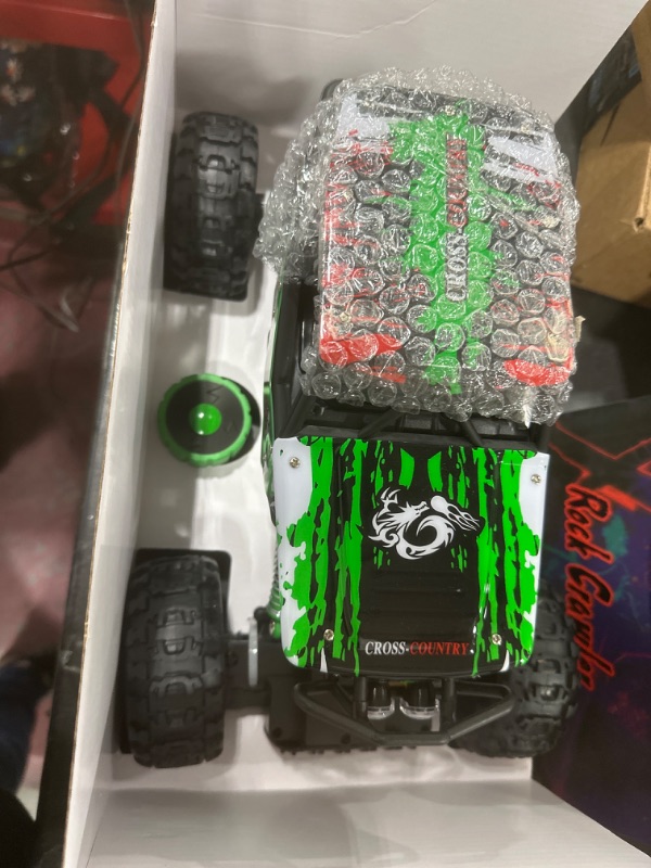 Photo 2 of DOUBLE E 1:12 Remote Control Car Monster Trucks with Head Lights 4WD Off All Terrain RC Car Rechargeable Vehicles Green