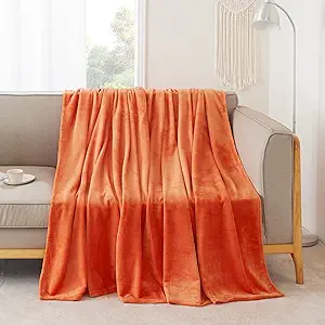 Photo 1 of  NICETOWN Orange Kids Christms Gift Fleece Blanket Twin Size Super Soft Flannel Throw Blanket for School Sport Apartment, Lightweight Fuzzy Plush Winter Blanket for Couch Sofa or Bed, 60" x 80"
