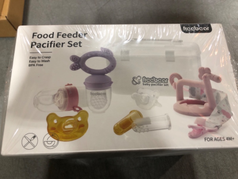 Photo 2 of Freebear Baby Fruit Feeder Baby Teething Toys, Baby Feeding Spoon for First Stage, Pacifer, Teething Pacifier Freezer Silicone Feeder, Infants Teether, Baby Food Feeding Supplies (5 in 1, Pink)