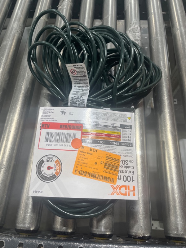 Photo 2 of 100 ft. 16/3 Indoor/Outdoor Extension Cord, Green
