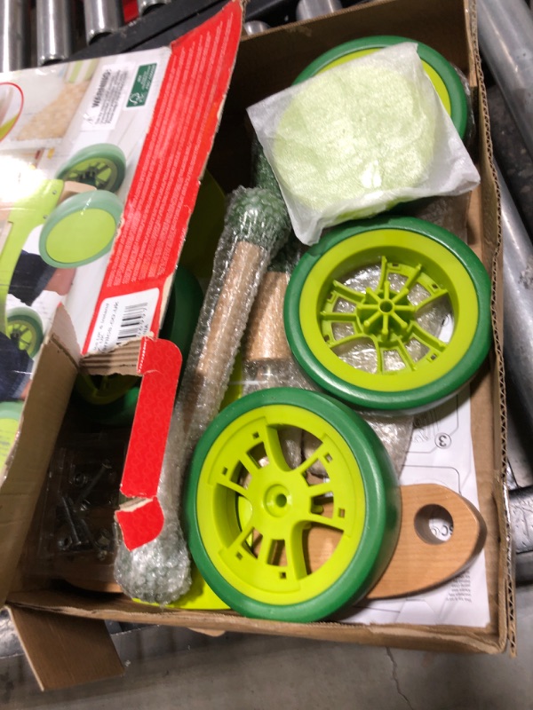 Photo 2 of Hape Scoot Around Ride On Wood Bike | Award Winning Four Wheeled Wooden Push Balance Bike Toy for Toddlers with Rubberized Wheels, Bright Green