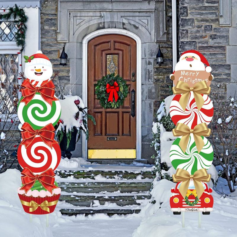 Photo 1 of 2 Pieces Christmas Outdoor Decorations Yard Signs Peppermint Candy Yard Decorations Christmas Plastic Yard Stakes Signs Christmas Lawn Decorations for Holiday Garden Patio Pathway
