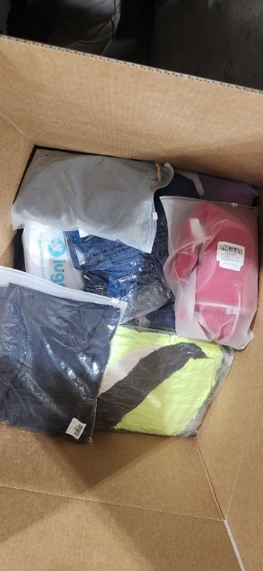 Photo 1 of Box lot of new and used clothing of all sizes and styles. 25 pieces in the lot. Sold as is.